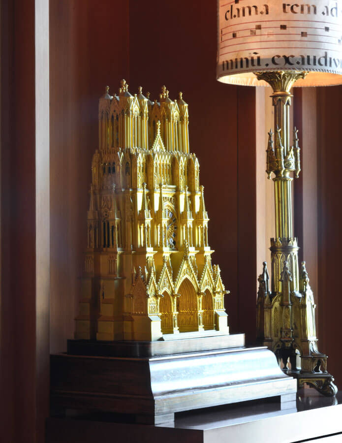 PIraneseum's Gilded Bronze Rheims Cathedral Clock on its original rosewood base.