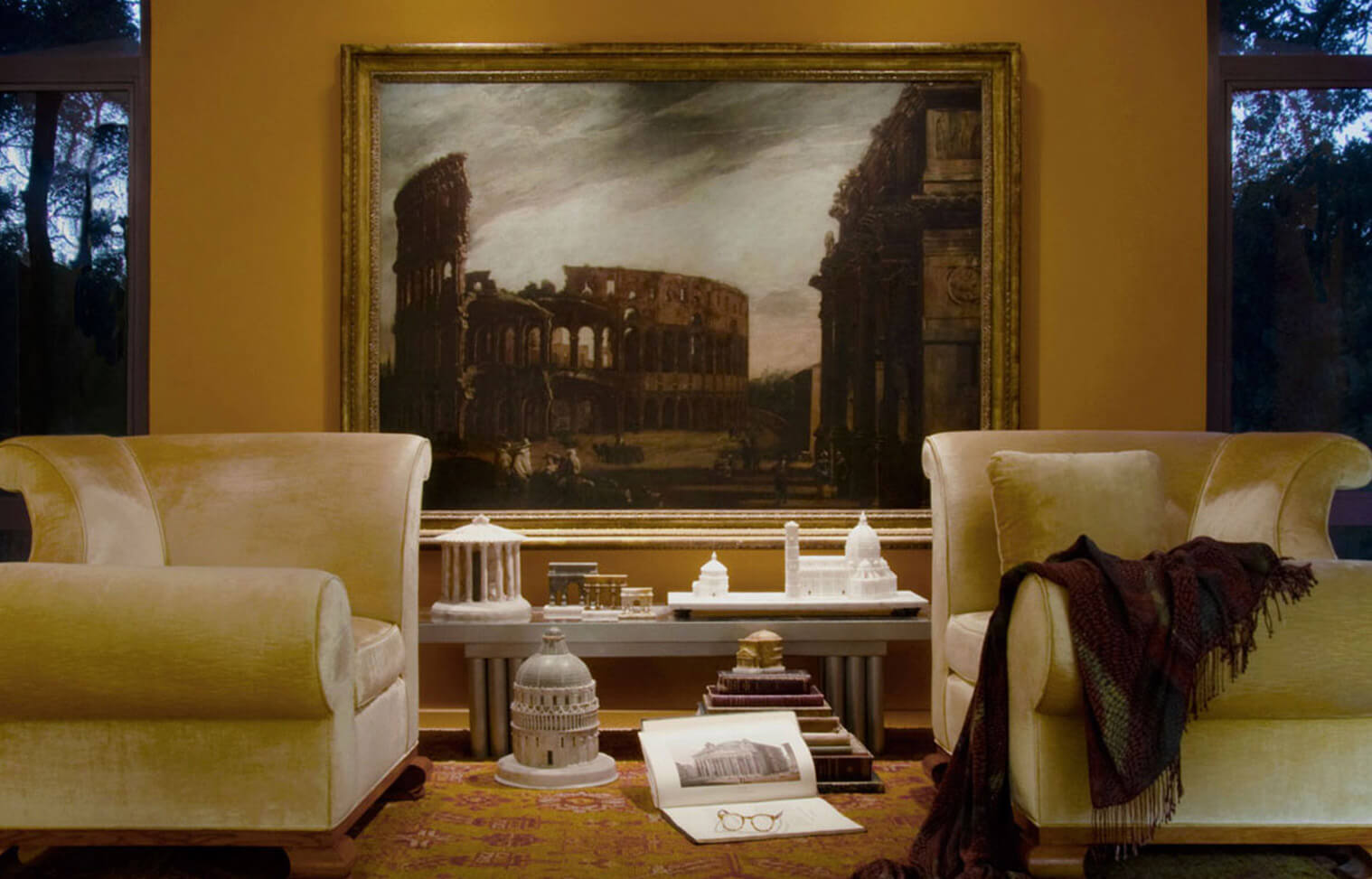 The Piraneseum Gallery extends to more domestic spaces, like this bedroom dominated by Codazzi's 17th Cenmtury View of the Colosseum in Rome.