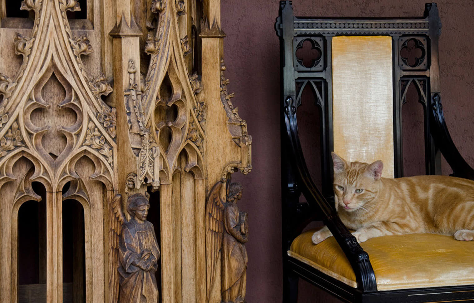 A pair of ivory inlaid ebony chairs by John Pollard Seddon with an English Gothic Revival carved oak baptismal font canopy are included in PIraneseum's Decorative Arts Collection.